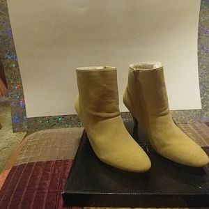 Donna Salyers 3 1/2 ankle suede boots.